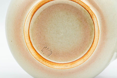 Japanese Tea Set - Tsubaki Kiln Hagi-yaki Kyusu Teapot with 6 Yunomi Teacups - closeup of the gold-rimmed interior at the base of the teapot