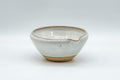 Tezumi — Japanese Tea Set - 赤膚山 Akiyama Kiln - Houhin Teapot and Katakuchi Water Cooler — closeup of a single piece