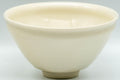 Tezumi — Japanese Matcha Bowl - Teiichi Oketani 定一桶谷 White Shiro Tenmoku Kyo-yaki Chawan - 250ml — tipped to show the interior