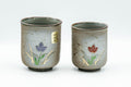 Japanese Teacups - Pair of Floral Green Meoto Yunomi - Arita-yaki - the meoto pair of floral teacups shown side by side