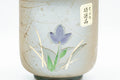 Japanese Teacups - Pair of Floral Green Meoto Yunomi - Arita-yaki - closeup of a single cup showing the painted floral decoration