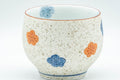 Japanese Teacup - Floral Arita-yaki Porcelain Yunomi - 150ml - closeup of the hand-painted blue and orange flowers