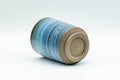 Japanese Teacup - Sky Blue Glazed Tsutsu-gata Yunomi - 170ml - the yunomi tilted to show the unglazed foot