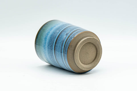 Japanese Teacup - Sky Blue Glazed Tsutsu-gata Yunomi - 170ml - the yunomi tilted to show the unglazed foot