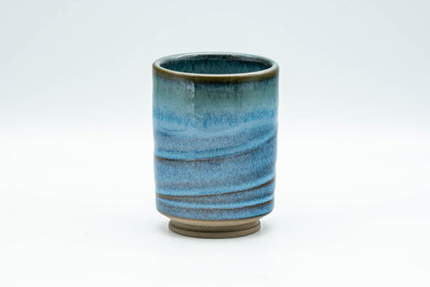 Japanese Teacup - Sky Blue Glazed Tsutsu-gata Yunomi - 170ml - front view of the yunomi showing the streaked blue glaze