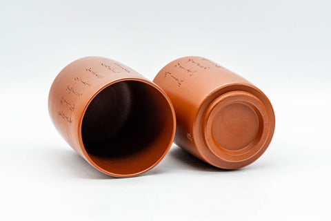 Japanese Teacups - Pair of Kanji Tokoname-yaki Meoto Yunomi - the cups tilted to show the unglazed feet