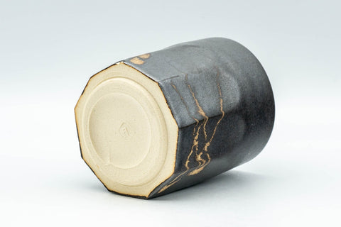 Japanese Teacup - Matte Black Nonagonal Yunomi - 160ml - tilted to show the glazed base