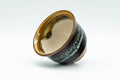 Japanese Teacups - Set of 5 Drip-Glazed Yunomi - 80ml - a teacup tilted to show the unglazed base