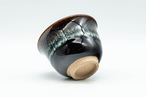 Japanese Teacups - Set of 5 Drip-Glazed Yunomi - 80ml - a teacup tilted to show the unglazed foot