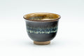 Japanese Teacups - Set of 5 Drip-Glazed Yunomi - 80ml - a single teacup showing the orange rim and beige interior