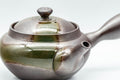 Tezumi — Japanese Kyusu - 萬古焼 Obi-ami Banko-yaki Teapot with Green Ash Glaze - 350ml — closeup of the decoration