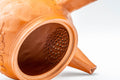 Japanese Kyusu - 不老 Itou Furo - Plum Blossoms Tokoname-yaki Do-ake Teapot - 250ml - closeup of the interior showing the ceramic do-ake filter