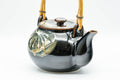 Tezumi — Japanese Dobin - Black Floral Debeso Top-Handle Teapot - 600ml — side view with the lid and side handle