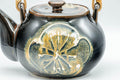 Tezumi — Japanese Dobin - Black Floral Debeso Top-Handle Teapot - 600ml — closeup of the decoration