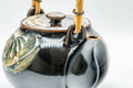 Tezumi — Japanese Dobin - Black Floral Debeso Top-Handle Teapot - 600ml — side profile showing the spout and handle