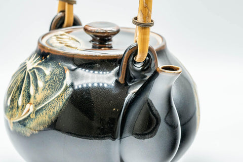 Tezumi — Japanese Dobin - Black Floral Debeso Top-Handle Teapot - 600ml — side profile showing the spout and handle