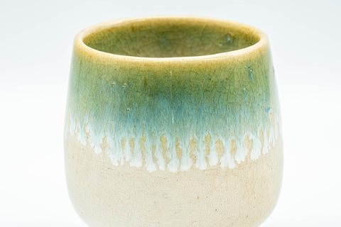 Tezumi — Japanese Teacup - Green-Blue Agano-yaki Yunomi - 100ml — tipped to show the interior
