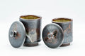 Tezumi — Japanese Teacups - Pair of Drip-Glazed Lidded Meoto Yunomi — front view