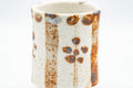 Tezumi — Japanese Teacup - Floral Shino Glazed Tsutsu-gata Yunomi - 160ml — top-down view of the interior