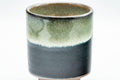 Tezumi — Japanese Teacup - Jet Black and Grey Hare's Fur Glazed Yunomi - 120ml — tipped to show the interior