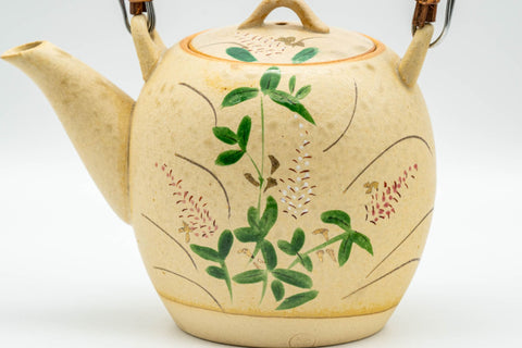 Japanese Tea Set - Floral Beige Glazed Debeso Dobin Teapot and 2 Yunomi Teacups - three-quarter view of the dobin teapot