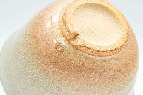 Tezumi — Japanese Teacups - Pair of Beige Peach Classic Hagi-yaki Yunomi - 100ml — tipped to show the interior