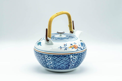 Tezumi — Japanese Dobin - Blue Floral Parrots White Debeso Teapot - 600ml — side view showing the spout