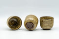 Tezumi — Japanese Teacups - Set of 3 Yellow Brown Striped Guinomi - 40ml — front view from another angle