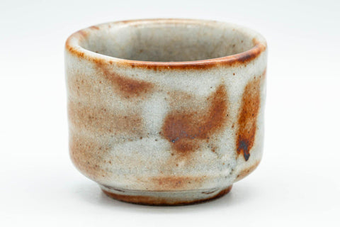 Tezumi — Japanese Teacup - Orange Milky White Shino Glazed Guinomi - 50ml — tipped to show the interior