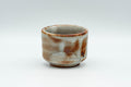 Tezumi — Japanese Teacup - Orange Milky White Shino Glazed Guinomi - 50ml — front view