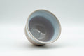 Tezumi — Japanese Teacup - Peach and Blue Interior Glazed Hagi-yaki Yunomi - 120ml — three-quarter view