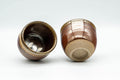 Tezumi — Japanese Teacups - Pair of Red Honey Drip-Glazed Yunomi - 90ml — three-quarter view