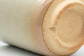 Tezumi — Japanese Teacup - Kanji Peach Hagi-yaki Yunomi - 200ml — inverted showing the foot ring
