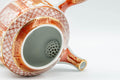 Tezumi — Japanese Kyusu - Red and Golden Geometric Patterned Katani-yaki Debeso Teapot - 200ml — side profile showing the spout and handle