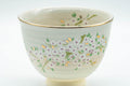 Tezumi — Japanese Teacup - Floral Gold Kyo-yaki Yunomi - 110ml — tipped to show the interior