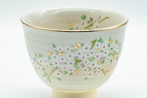 Tezumi — Japanese Teacup - Floral Gold Kyo-yaki Yunomi - 110ml — tipped to show the interior