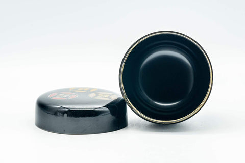 Tezumi — Japanese Natsume - Gold and Red Emblemed Black Lacquer Matcha Tea Caddy - 100ml — closeup of the finish