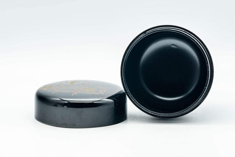 Tezumi — Japanese Natsume - Floral Geometric Black Lacquer Matcha Tea Caddy - 100ml — closeup of the finish