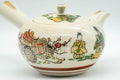 Tezumi — Japanese Kyusu - Golden Villagers Kutani-yaki Debeso Teapot - 300ml — closeup of the decoration
