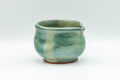 Japanese Tea Set - Green Glazed Dobin Do-ake Teapot with Katakuchi Water Cooler and 2 Yunomi Teacups - side view of one of the yunomi teacups