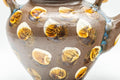 Tezumi — Japanese Tea Set - Brown Dobin Do-ake Teapot with 3 Yunomi Teacups — closeup of a single piece