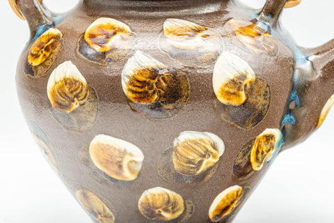 Tezumi — Japanese Tea Set - Brown Dobin Do-ake Teapot with 3 Yunomi Teacups — closeup of a single piece