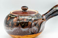 Tezumi — Japanese Tea Set - Drip Glazed Arita-yaki Debeso Kyusu Teapot with 4 Yunomi Teacups — closeup of the decoration