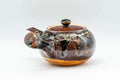 Tezumi — Japanese Tea Set - Drip Glazed Arita-yaki Debeso Kyusu Teapot with 4 Yunomi Teacups — interior of the teapot showing the filter