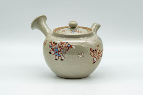 Japanese Tea Set - Banko-yaki Butterflies Kyusu Teapot and 2 Yunomi Teacups - side view of the speckled grey teapot showing the painted butterfly and village motif