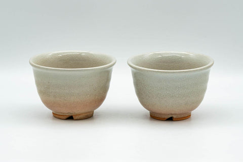 Tezumi — Japanese Teacups - Pair of Beige Peach Classic Hagi-yaki Yunomi - 100ml — front view from another angle