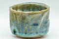 Tezumi — Japanese Teacup - Turquoise Wabi-Sabi Yunomi - 90ml — tipped to show the interior