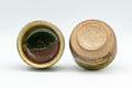 Tezumi — Japanese Teacups - Pair of Green Ash Glazed Shigaraki-yaki Guinomi - 40ml — three-quarter view