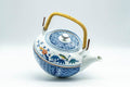 Tezumi — Japanese Dobin - Blue Floral Parrots White Debeso Teapot - 600ml — top-down view of the lid