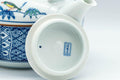 Tezumi — Japanese Dobin - Blue Floral Parrots White Debeso Teapot - 600ml — closeup of the base
